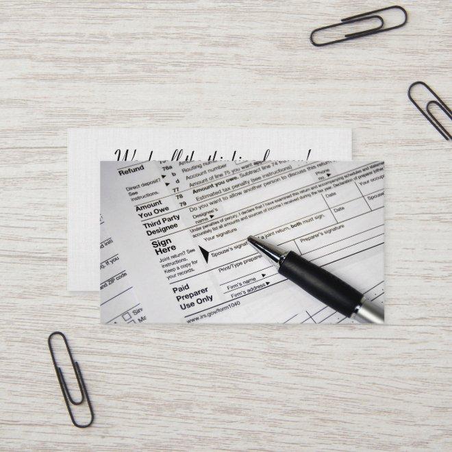 1040 income tax form with ink pen