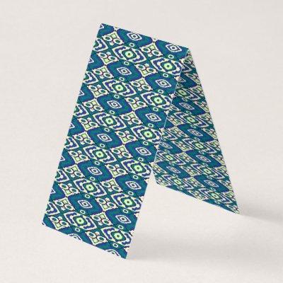 a blue and green pattern with a white background