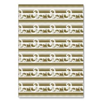 A richly colored rug features a symmetrical geomet table number