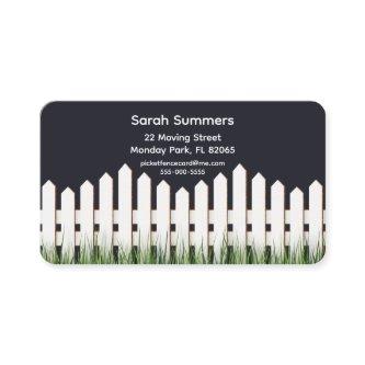 Address card with white picket fence and grass