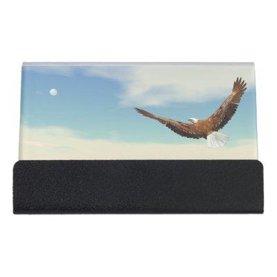Bald eagle flying upon the ocean to the moon desk  holder