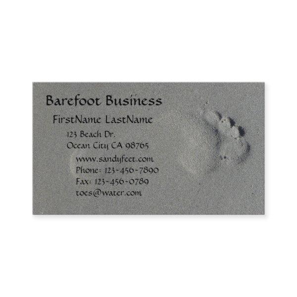 Barefoot footprint in sand photo