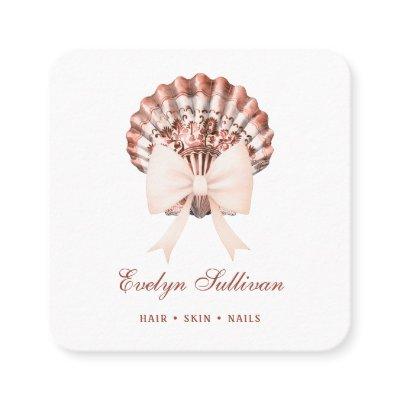 Beige watercolor bow seashell logo