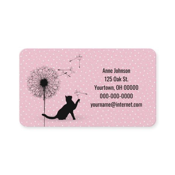 Black cat with dandelion on dots