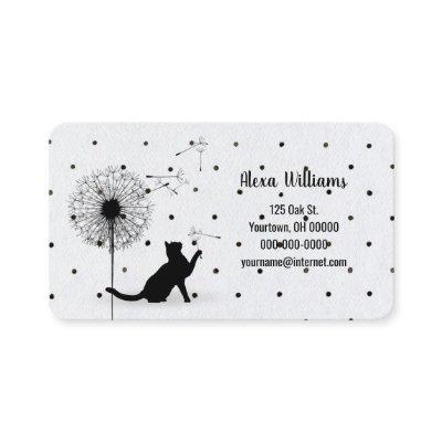 Black cat with dandelion on polka dots