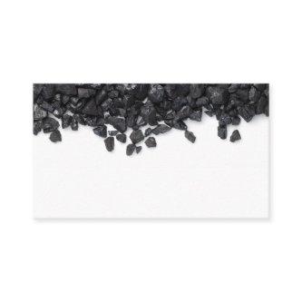 Black coal isolated on white background. Pea coal