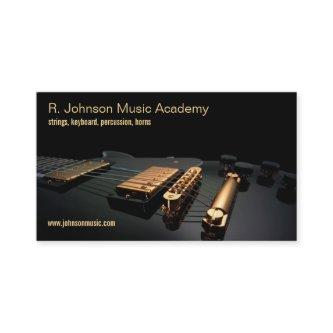 black guitar music instructor