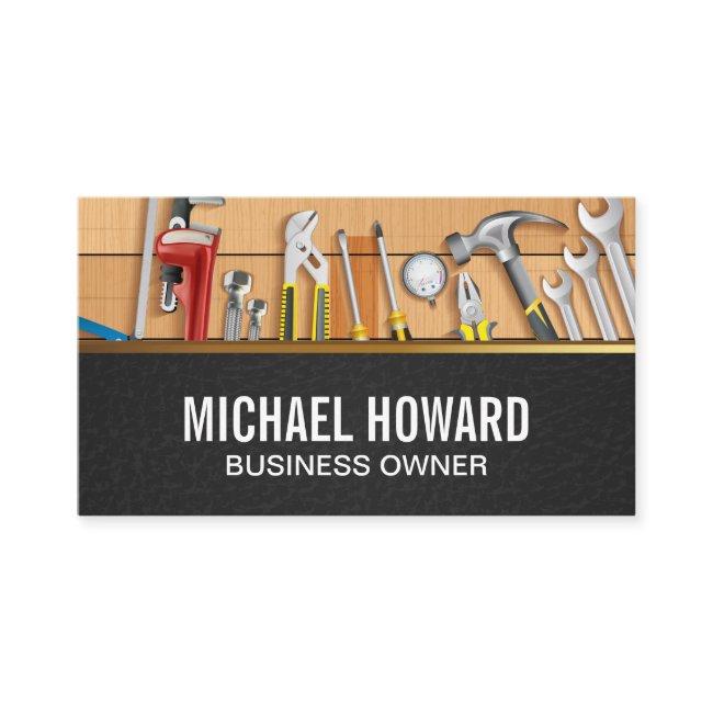 Builder Repair Tools on Wood Table