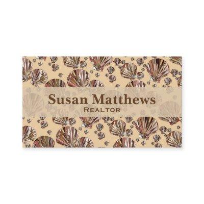 Cocoa and tan sea shells, caramel tan background