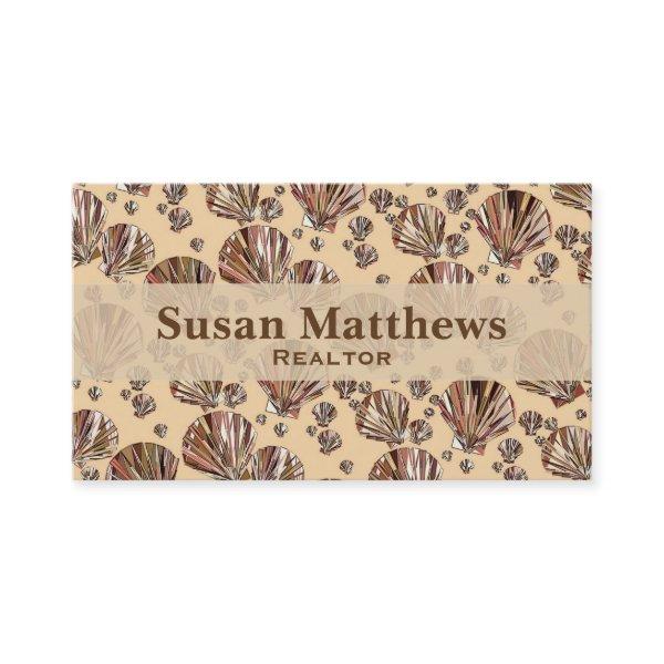 Cocoa and tan sea shells, caramel tan background