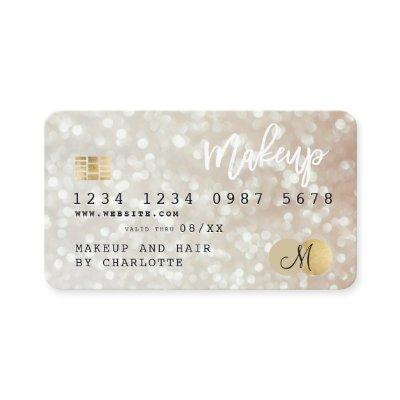 Credit card gold bokeh hair makeup monogram