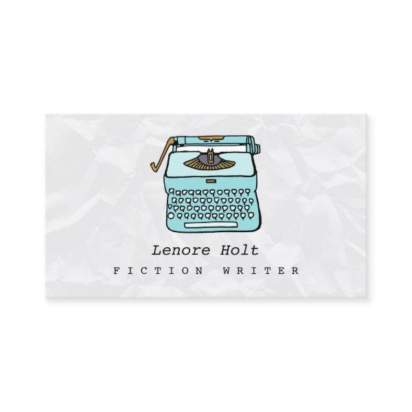 Cute Fiction Writer With Retro Blue Typewriter