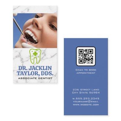 Dentist Inspecting Teeth | Tooth Aid Logo