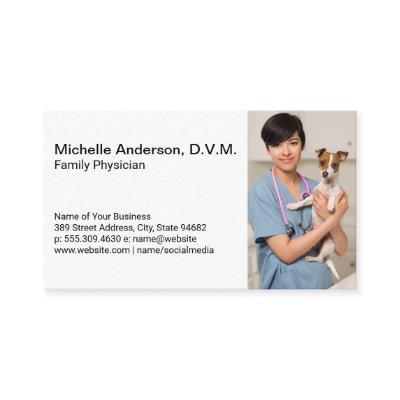 Doctor of Veterinarian Holding Dog