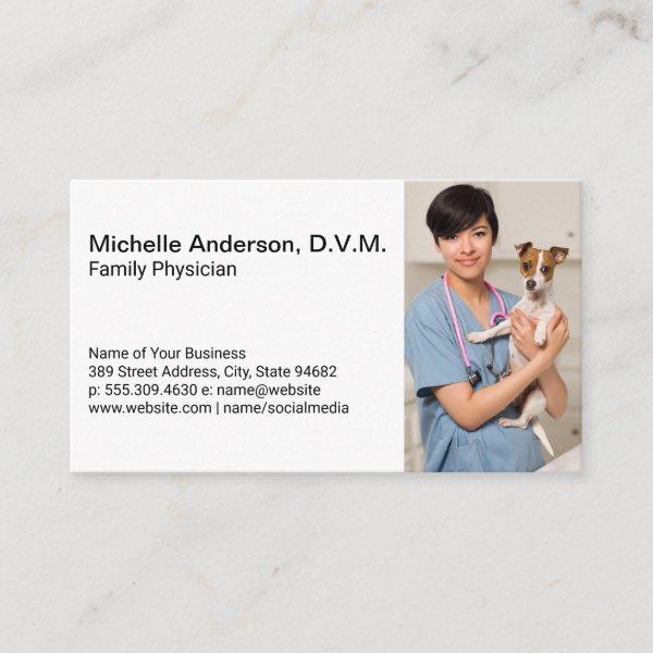 Doctor of Veterinarian Holding Dog