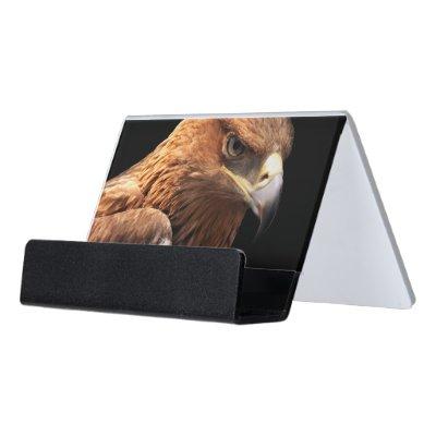 Eagle portrait isolated on black desk  holder