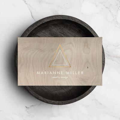 Edgy Rose Gold Triangle Logo on Beige Wood