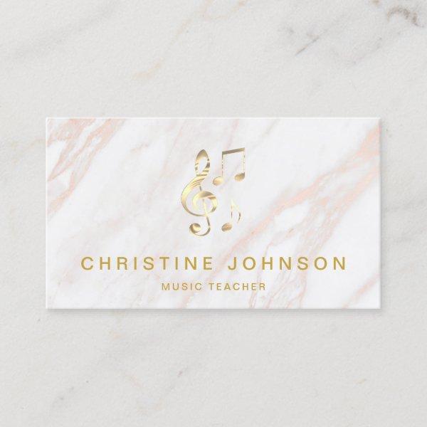 elegant faux gold treble clef on pink marble