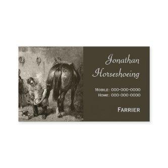 Farrier fitting a hot shoe