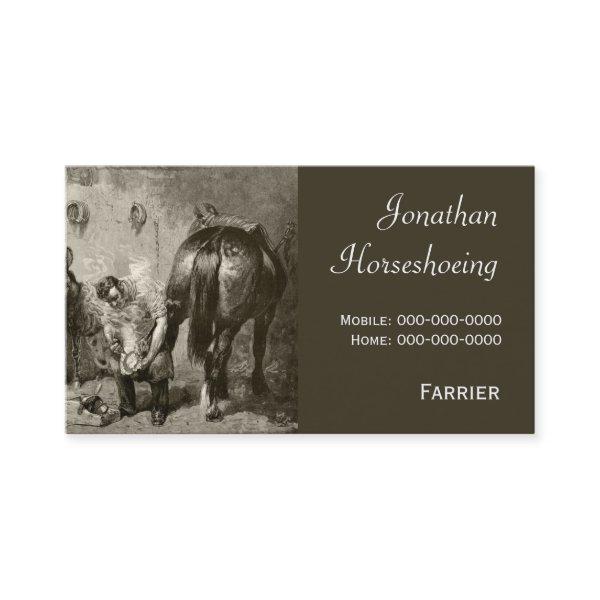 Farrier fitting a hot shoe