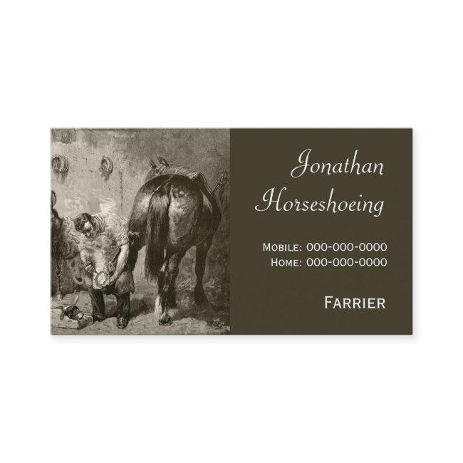 Farrier fitting a hot shoe