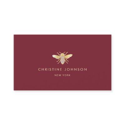 faux gold foil bee jewel on dark red