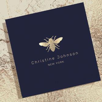 faux gold foil logo bee on dark blue square
