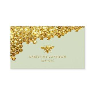 faux gold glitter bee on sage green background