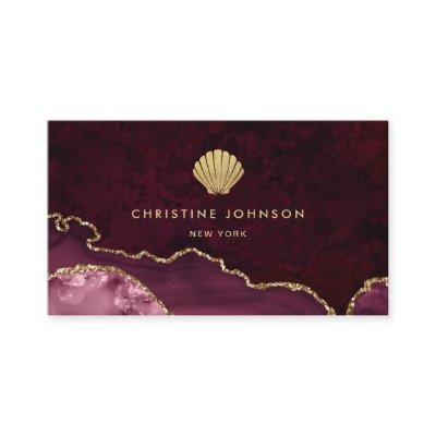 faux gold glitter seashell on burgundy