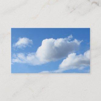 Fluffy Clouds in a Blue Sky