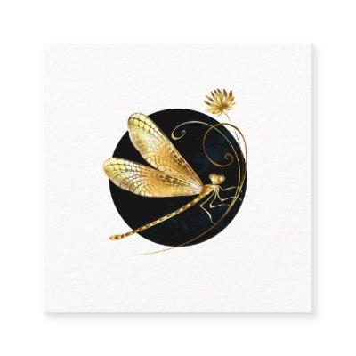 Golden dragonfly in black circle square