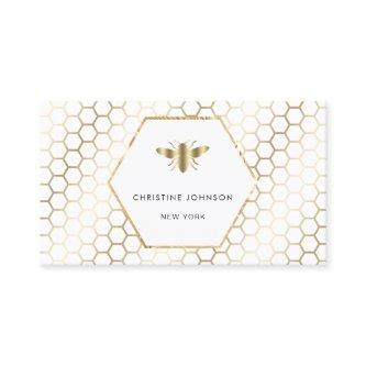 honeycomb and hexagon bee logo on white