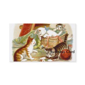 Kittens in a Basket playing