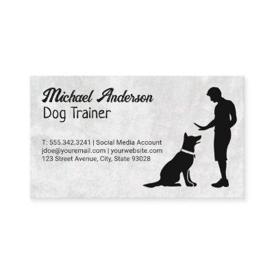 Man Training Pet Dog