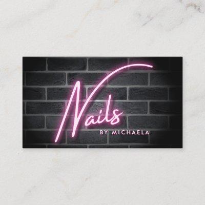 Modern Pink Neon 'Nails' Sign On Brick Wall