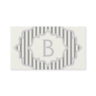 Monogram in a frame with grey, white stripes