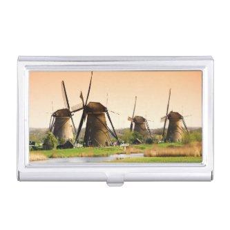 Netherlands, Kinderdijk. Windmills next to  Case