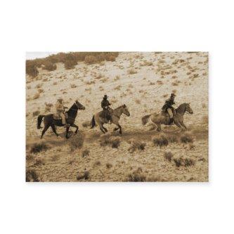 Old West Cowboys Riding