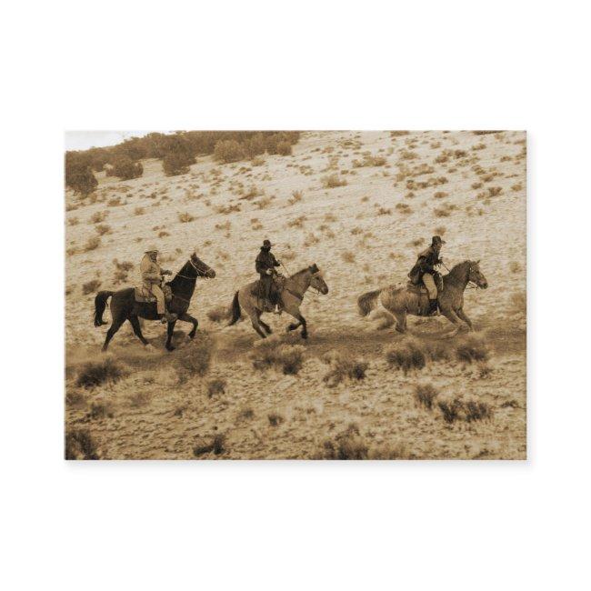 Old West Cowboys Riding