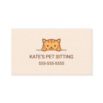 Orange Tabby Cat Peeking Pet Sitting Service