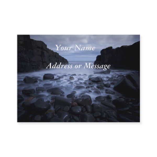Pebbles and rocks along the ocean shoreline. busin
