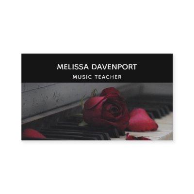 Piano Keys with a Red Rose
