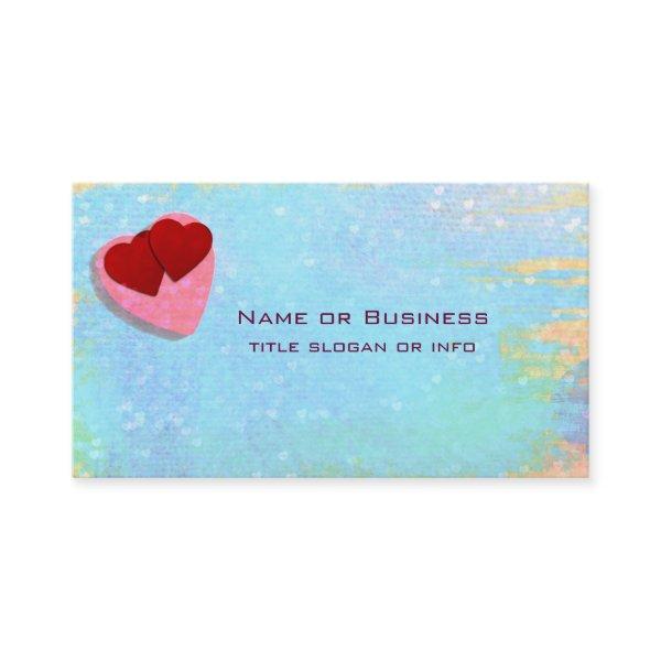 Pink and Red hearts on a Blue Textured Background