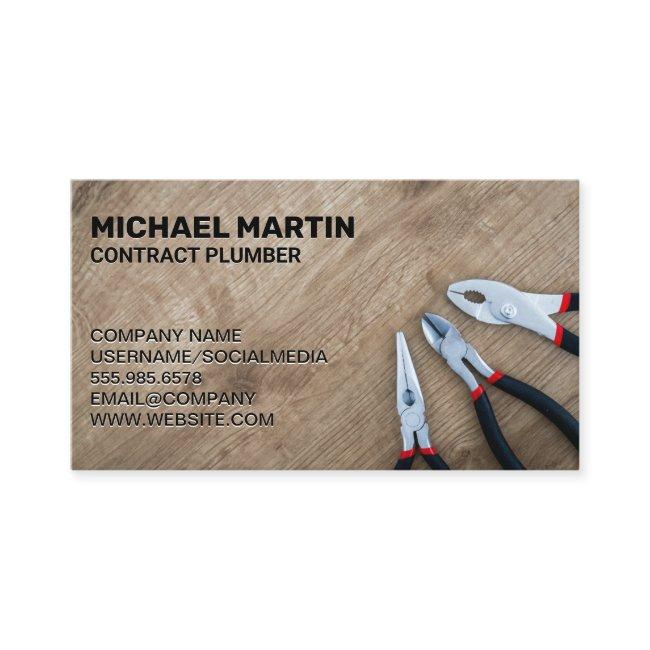 Pliers on Wood Table