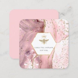 queen bee logo on pink agate square