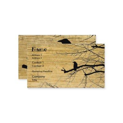 Raven on the Tree with wooden background Business