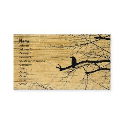 Raven on the Tree with wooden background