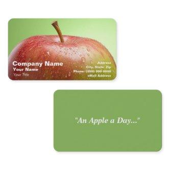 Red Apple on Green Background