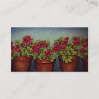 Red Geraniums in clay pots