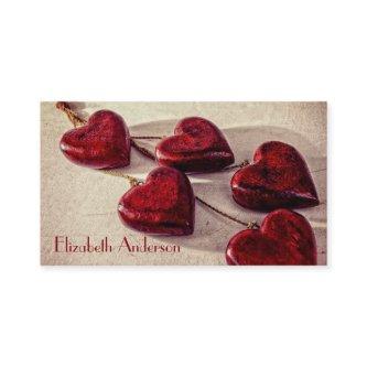 Red Wooden Hearts Tied Together on a String